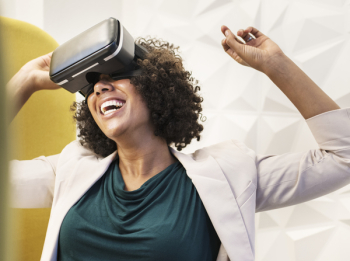 Woman Smiling Using Vr Goggles Woman Smiling Using Vr Goggles