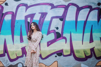 Woman Standing Against Mural Woman Standing Against Mural