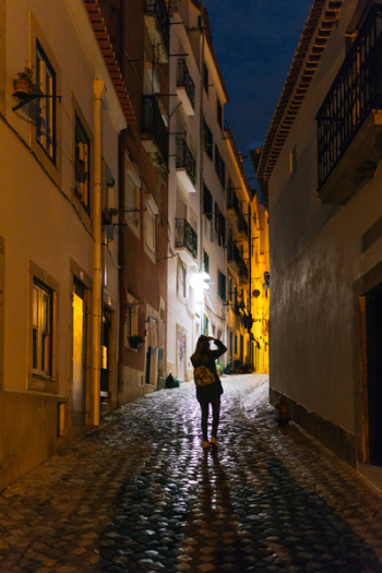 Woman Standing in Alley Woman Standing in Alley