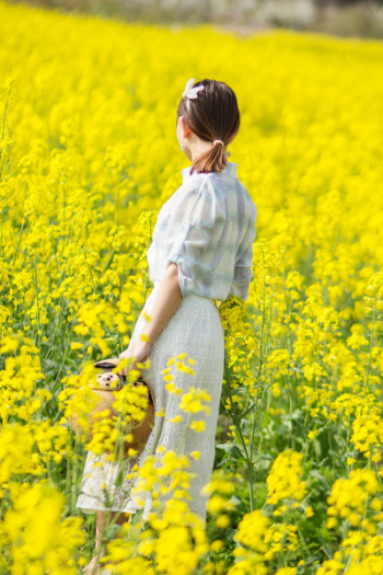 Woman Standing in Flower Field Woman Standing in Flower Field