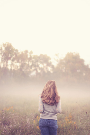 Woman Standing in Front of Green Grass Woman Standing in Front of Green Grass