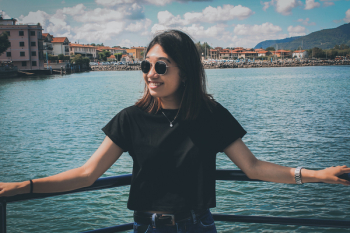 Woman Standing in Front of Sea Woman Standing in Front of Sea