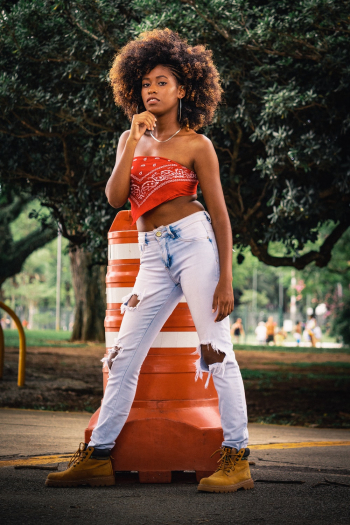 Woman Standing in Front of Street Cone Woman Standing in Front of Street Cone