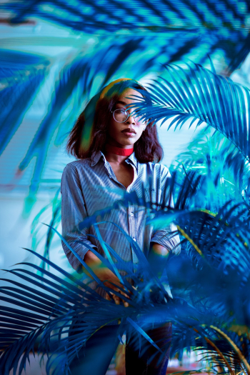Woman Standing Near Plant Woman Standing Near Plant
