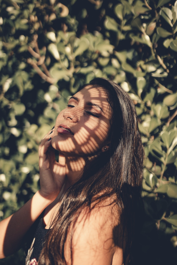 Woman Standing Near Plant Woman Standing Near Plant