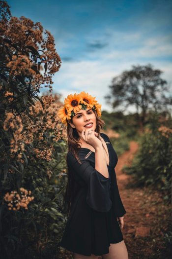 Woman Standing Near Plant Woman Standing Near Plant