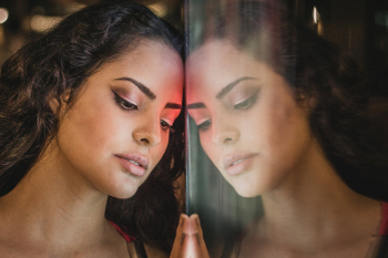 Woman Standing Near the Glass Mirror Woman Standing Near the Glass Mirror