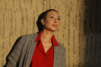 Woman Standing Near Wall Woman Standing Near Wall