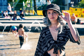 Woman Standing Near Water Fountain