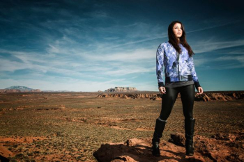 woman standing on brown soil woman standing on brown soil