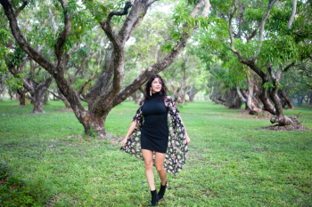 Woman Standing On Grass