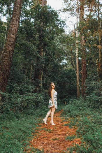 Woman Standing on Grass