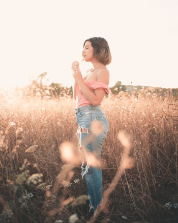 woman standing on grass field