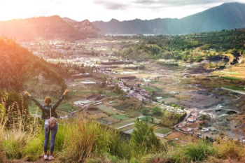 woman standing on mountain woman standing on mountain
