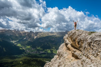 woman standing on mountain woman standing on mountain