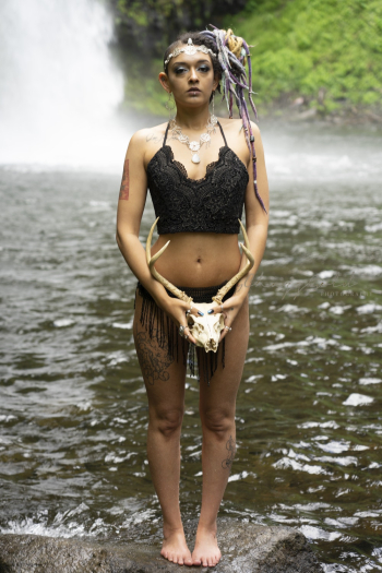 Woman Standing on Rock Near Flowing Water Woman Standing on Rock Near Flowing Water