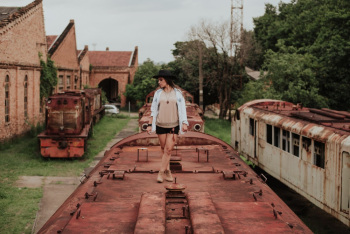 Woman Standing on Roof of Train Woman Standing on Roof of Train