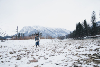 Woman Standing on Snow Field Woman Standing on Snow Field