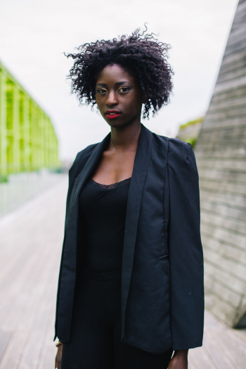 Woman Standing Wearing Blazer Woman Standing Wearing Blazer