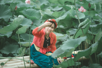 Woman Surrounded by Water Lilies Woman Surrounded by Water Lilies