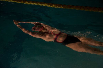 woman swimming on pool woman swimming on pool