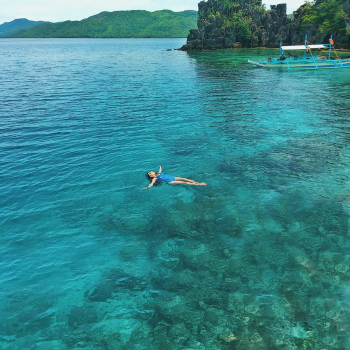 Woman Swimming on Sea Woman Swimming on Sea