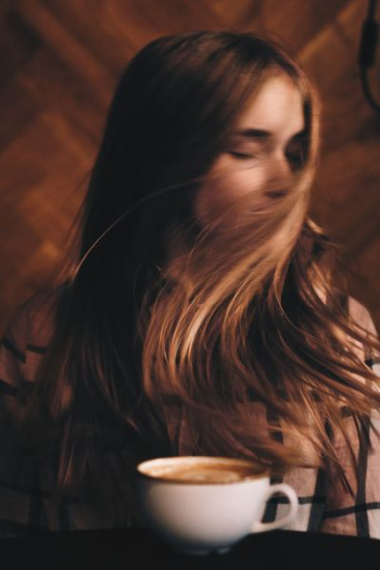 woman taking selfie indoors