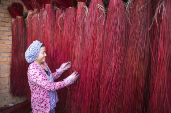 Woman Touching Red Broom Woman Touching Red Broom