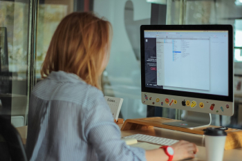 Woman Using Computer in Office Woman Using Computer in Office