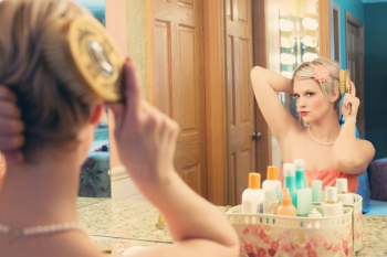 Woman Using Hair Brush Woman Using Hair Brush