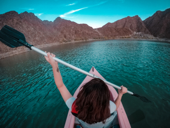 Woman Using Paddle