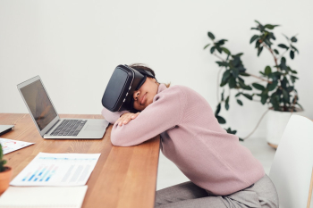 Woman Using Virtual Reality Goggles Woman Using Virtual Reality Goggles