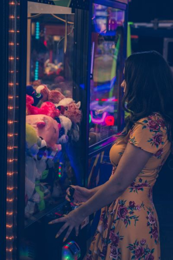 woman watching plush toy lot