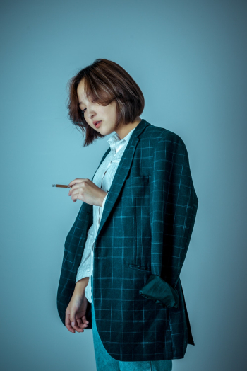 Woman Wearing A Blazer Woman Wearing A Blazer