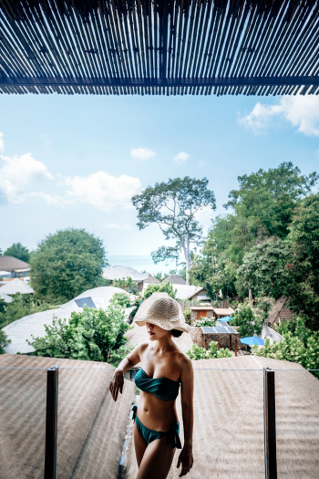 Woman Wearing Bikini and Sun Hat Woman Wearing Bikini and Sun Hat