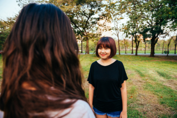 Woman Wearing Black Boat-neck Shirt on Green Grass Woman Wearing Black Boat-neck Shirt on Green Grass