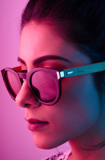 Woman Wearing Black Framed Wayfarer-style Sunglasses