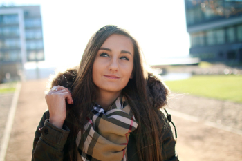 Woman Wearing Black Parka Jacket Smiling Woman Wearing Black Parka Jacket Smiling