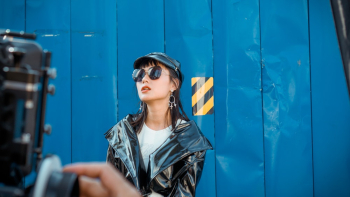 Woman Wearing Black Patent Leather Jacket