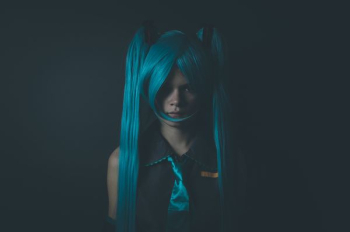 woman wearing blue anime suit woman wearing blue anime suit