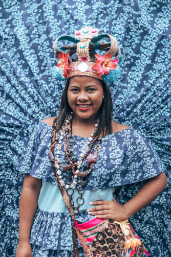 Woman Wearing Blue Floral Dress and Blue Crown Woman Wearing Blue Floral Dress and Blue Crown