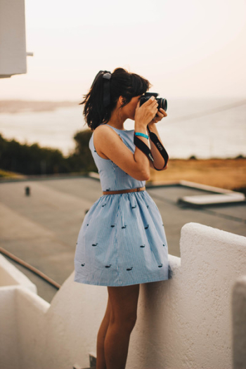 Woman Wearing Blue Sleeveless Dress Woman Wearing Blue Sleeveless Dress