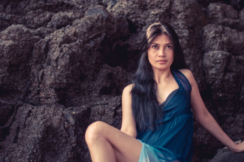 Woman Wearing Blue Sleeveless Dress Woman Wearing Blue Sleeveless Dress