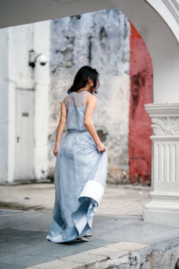 Woman Wearing Blue Sleeveless Dress Woman Wearing Blue Sleeveless Dress