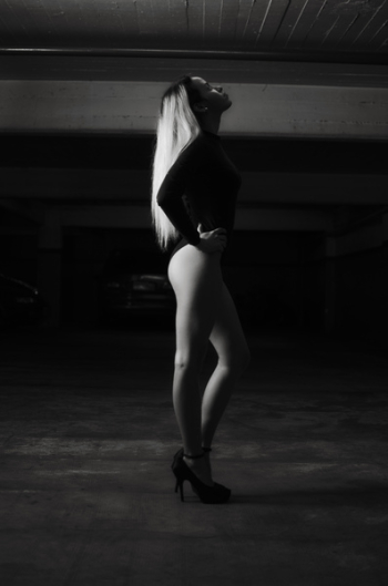 Woman Wearing Bodysuit and Pump Shoes Woman Wearing Bodysuit and Pump Shoes