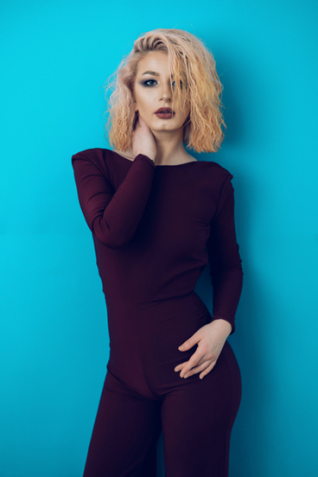 Woman Wearing Brown Bodysuit Woman Wearing Brown Bodysuit