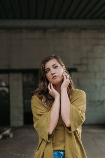 woman wearing brown cardigan