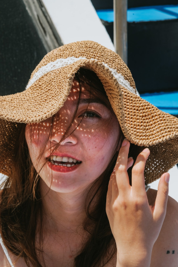 Woman Wearing Brown Sun Hat Woman Wearing Brown Sun Hat