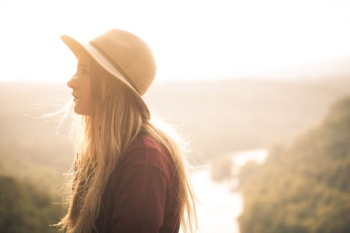 woman wearing brown sun hat woman wearing brown sun hat