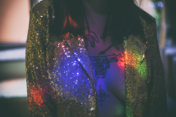 Woman Wearing Gold Glitter Suit Jacket Woman Wearing Gold Glitter Suit Jacket